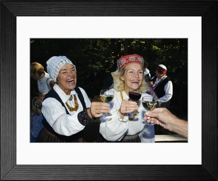 Framed Print : Woman in Traditional Dress enjoying Food and Wine Framed Print : Woman in Traditional Dress enjoying Food and Wine