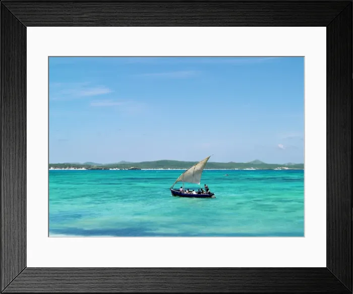Framed Print : Visitors to Suarez Island swim in the crystal-clear Framed Print : Visitors to Suarez Island swim in the crystal-clear