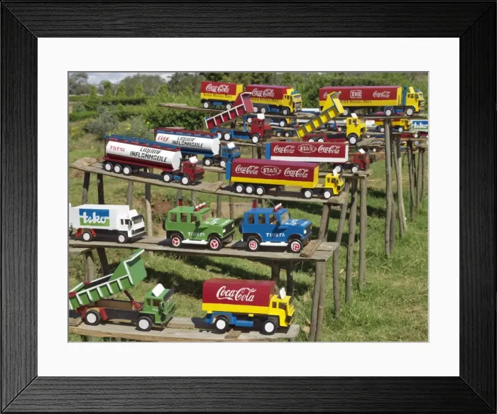 Framed Print : Replica trucks and lorries for sale at a roadside stall Framed Print : Replica trucks and lorries for sale at a roadside stall