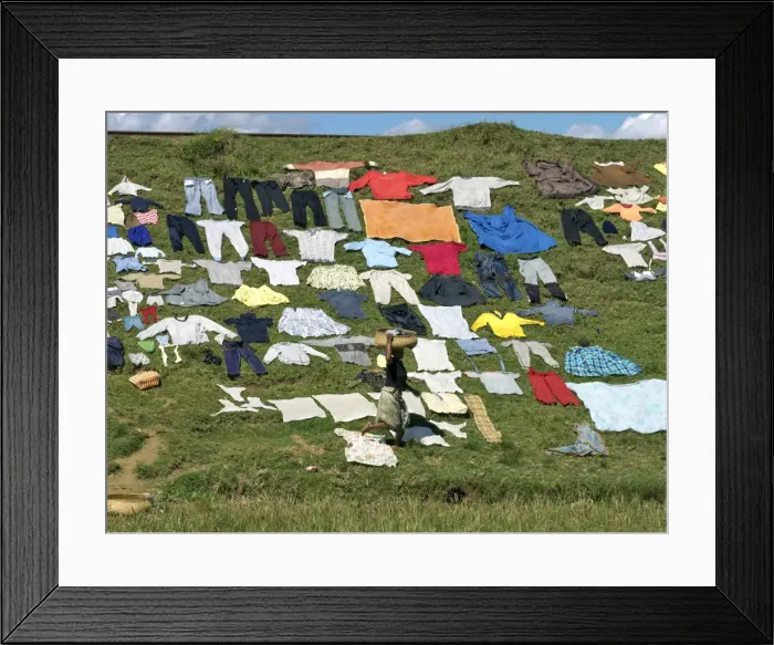 Framed Print : Washing put out to dry on a railway embankment near Antananarivo