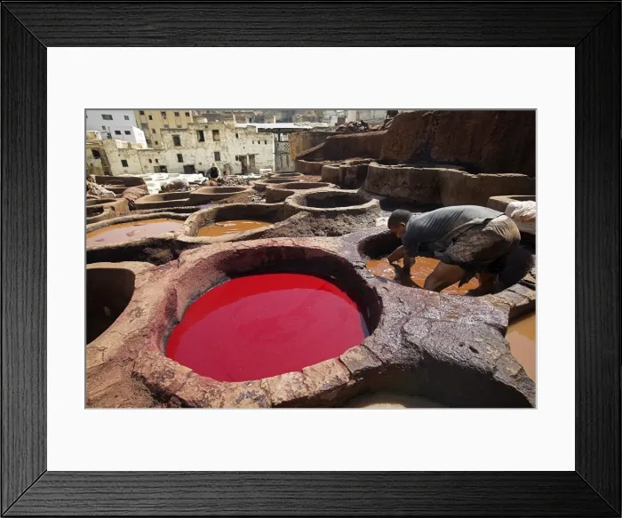 Framed Print : A man working in the tanneries in Old Fez, Morocco Framed Print : A man working in the tanneries in Old Fez, Morocco