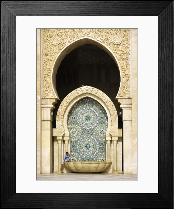 Framed Print : MOROCCO, Casablanca A visitor is dwarfed by the towering Framed Print : MOROCCO, Casablanca A visitor is dwarfed by the towering