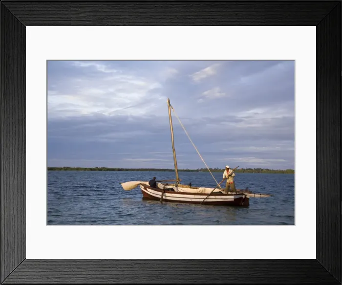 Framed Print : A traditional dhow makes its way to Ibo Island in Framed Print : A traditional dhow makes its way to Ibo Island in