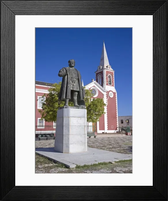 Framed Print : A statue of Vasco de Gama stands in front of the old Framed Print : A statue of Vasco de Gama stands in front of the old