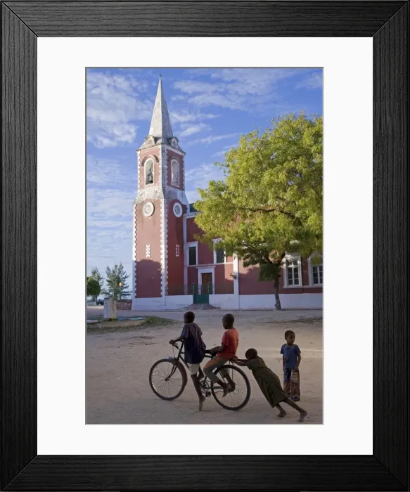 Framed Print : Children play in front of the governors palace Framed Print : Children play in front of the governors palace