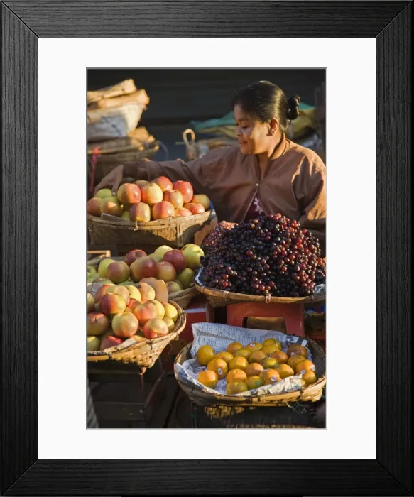 Framed Print : A woman sells a delicious selection of fresh fruit at Sittwes bustling market Framed Print : A woman sells a delicious selection of fresh fruit at Sittwes bustling market