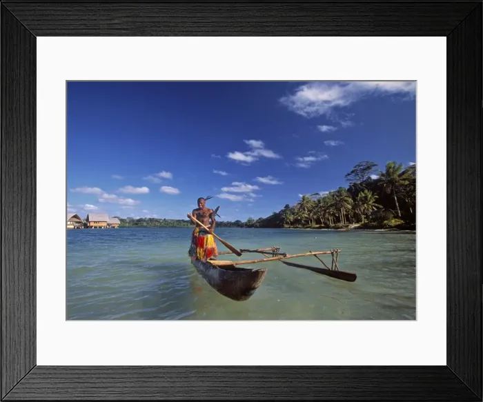Framed Print : Ni-Vanuatu warrior rowing a canoe, Vanuatu Framed Print : Ni-Vanuatu warrior rowing a canoe, Vanuatu