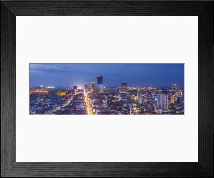 Framed Print : Cambodia, Phnom Penh, elevated city skyline along Monivong Boulevard, dusk Framed Print : Cambodia, Phnom Penh, elevated city skyline along Monivong Boulevard, dusk