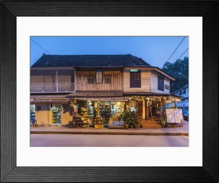 Framed Print : Laos, Luang Prabang, Mekong Riverfront buildings on Khem Khong Road, evening