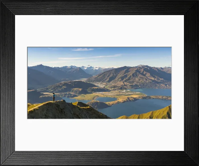 Framed Print : Woman taking photographs of Lake Wanaka and Mt Aspiring NP from Roys Peak track. Wanaka Framed Print : Woman taking photographs of Lake Wanaka and Mt Aspiring NP from Roys Peak track. Wanaka