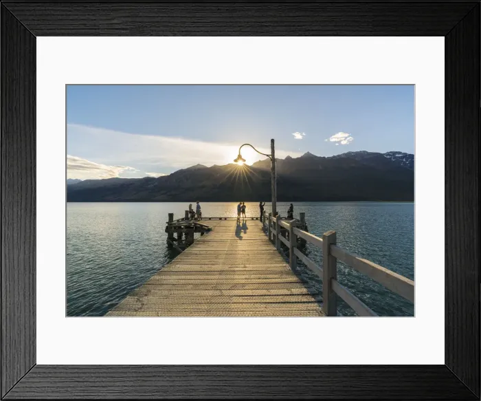 Framed Print : People on the jetty on Lake Wakatipu just before sunset Framed Print : People on the jetty on Lake Wakatipu just before sunset
