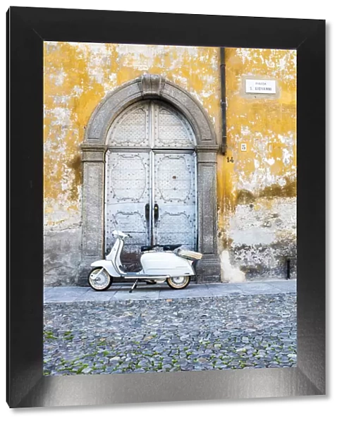 Iconic Lambretta Innocenti scooter in the old town, Morbegno, province of Sondrio
