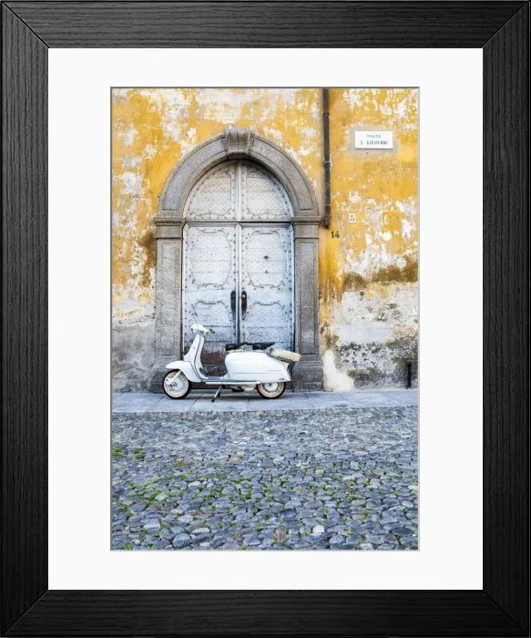 Framed Print : Iconic Lambretta Innocenti scooter in the old town, Morbegno, province of Sondrio Framed Print : Iconic Lambretta Innocenti scooter in the old town, Morbegno, province of Sondrio