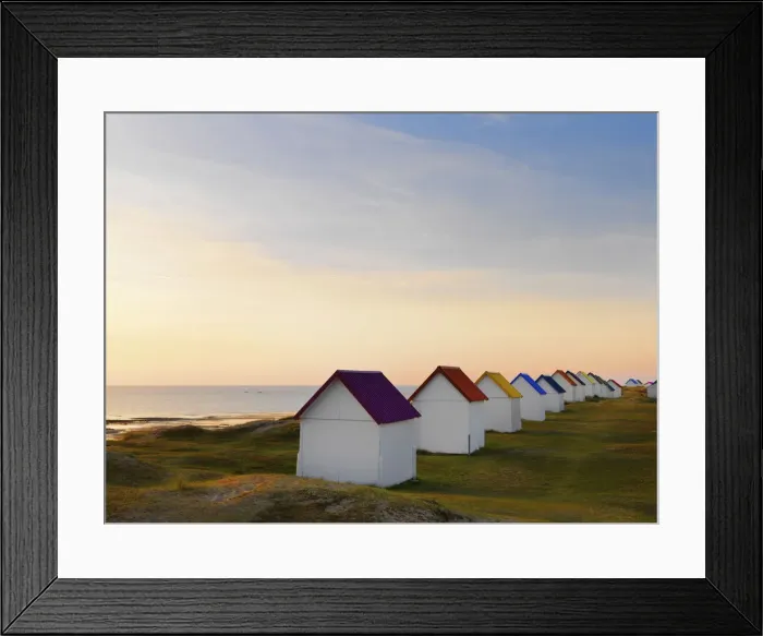 Framed Print : France, Normandy, Gouville Sur Mer, colourful beach huts at dusk Framed Print : France, Normandy, Gouville Sur Mer, colourful beach huts at dusk