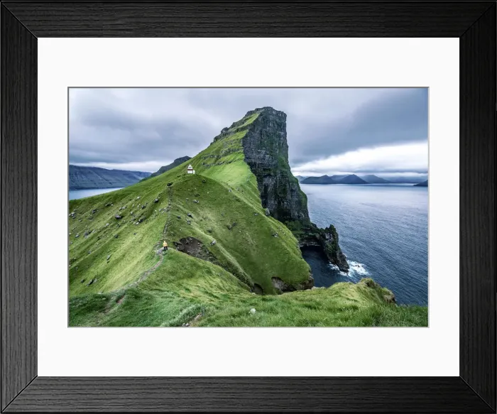 Framed Print : Hiker near the Kalsoy Lighthouse, Faroe Islands, Europe
