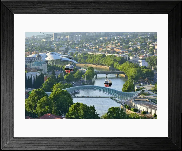 Framed Print : Bridge of Peace and the Mtkvari river. The famous Cable Car above. Tbilisi, Georgia Framed Print : Bridge of Peace and the Mtkvari river. The famous Cable Car above. Tbilisi, Georgia