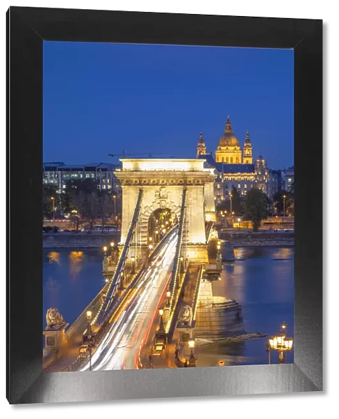 Chain Bridge (Szechenyi Bridge) and St Stephenas Basilica at dusk, Budapest, Hungary