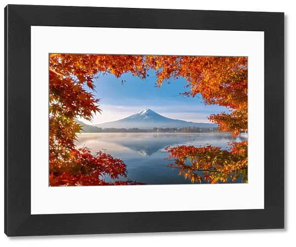 Lake Kawaguchi and Mt Fuji framed by red maple leaves in autumn, Yamanashi Prefecture