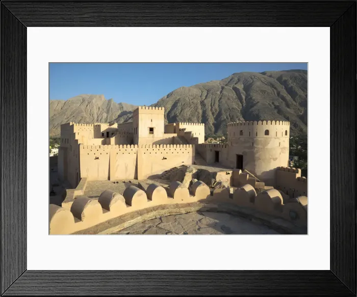 Framed Print : Oman, Al-Batinah Region, Nakhal, Nakhal Fort with the Jebel Nakhal mountains in Framed Print : Oman, Al-Batinah Region, Nakhal, Nakhal Fort with the Jebel Nakhal mountains in