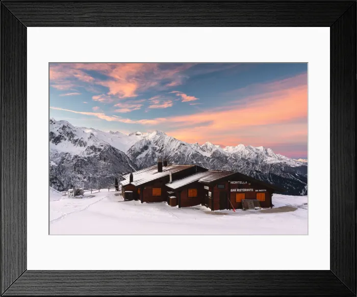 Framed Print : Nigritella refuge in Winter season at dawn, Stelvio national park in Camonica valley