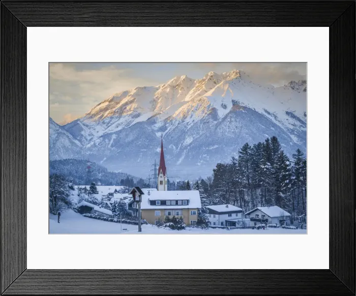Framed Print : The village of Vill in winter with the Nordkette in the background, Innsbruck, Tyrol Framed Print : The village of Vill in winter with the Nordkette in the background, Innsbruck, Tyrol