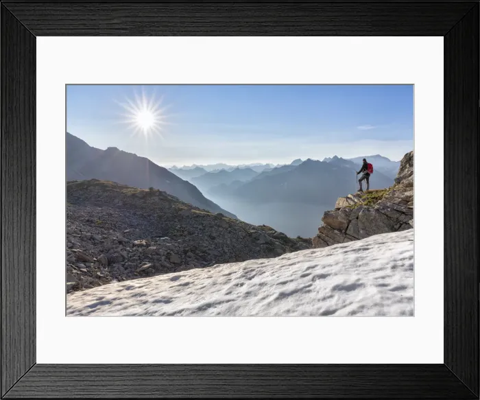 Framed Print : Hiker looking to the valley from the Peterskopfl, Ginzling, Zillertal, Tyrol, Austria
