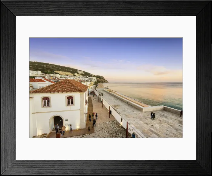 Framed Print : The fortress of the coastal fishing village of Sesimbra and the beach. Portugal Framed Print : The fortress of the coastal fishing village of Sesimbra and the beach. Portugal