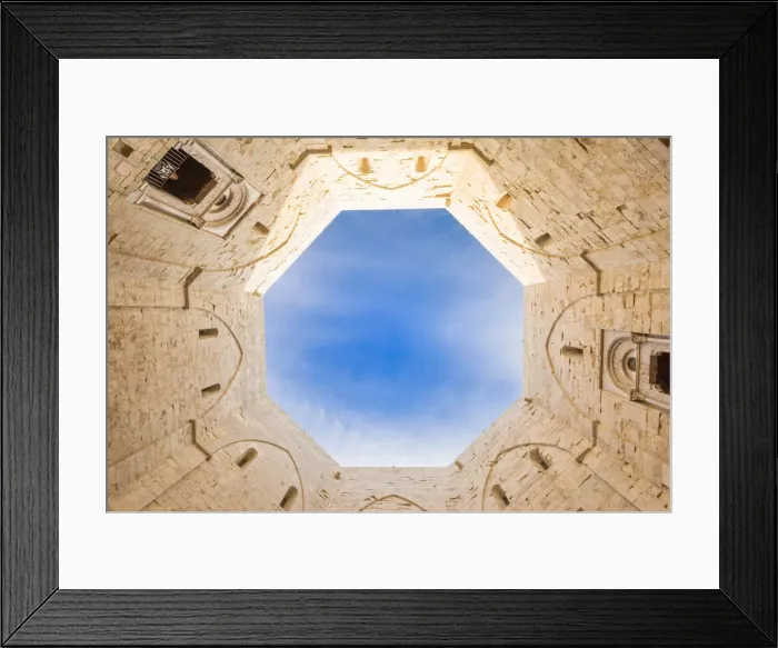 Framed Print : Cutting of sky viewed from the inside courtyard of Castel del Monte fortress in Andria Framed Print : Cutting of sky viewed from the inside courtyard of Castel del Monte fortress in Andria
