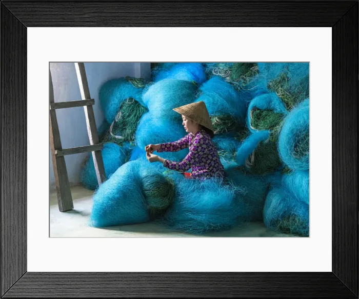 Framed Print : A Vietnamese woman mending blue fishing net, Mekong Delta, Vietnam Framed Print : A Vietnamese woman mending blue fishing net, Mekong Delta, Vietnam
