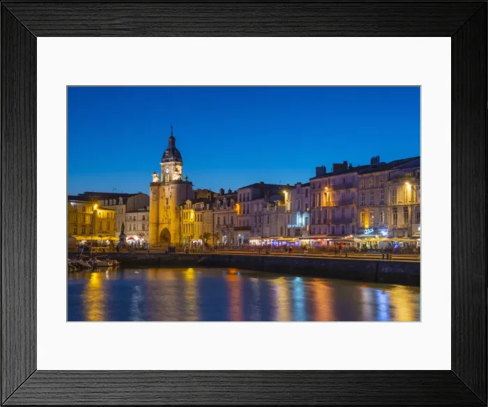 Framed Print : France, Poitou Charentes, La Rochelle, Old Harbour, Porte de La Grosse Horloge at dusk Framed Print : France, Poitou Charentes, La Rochelle, Old Harbour, Porte de La Grosse Horloge at dusk
