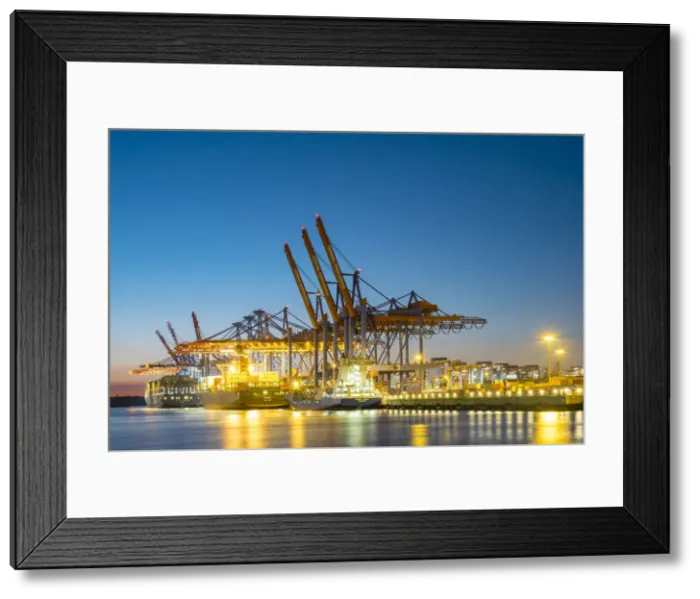 Framed Print : Cargo ships being loaded at Burchardkai in Hamburg Harbor at night, Waltershofer Hafen Framed Print : Cargo ships being loaded at Burchardkai in Hamburg Harbor at night, Waltershofer Hafen