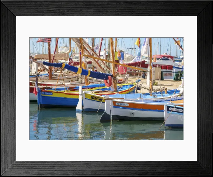 Framed Print : Traditional colorful wooden fishing boat in the port harbor at Sanary-sur-Mer, Var Framed Print : Traditional colorful wooden fishing boat in the port harbor at Sanary-sur-Mer, Var