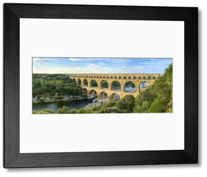 Framed Print : Pont du Gard Roman aqueduct over Gard River in late afternoon, Gard Department Framed Print : Pont du Gard Roman aqueduct over Gard River in late afternoon, Gard Department