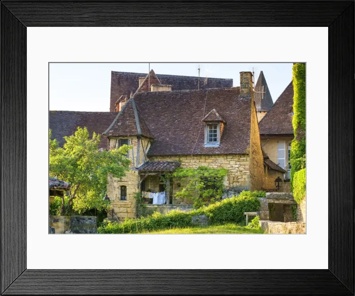 Framed Print : Beautiful old stone house on Rue Montaigne in late afternoon sun Framed Print : Beautiful old stone house on Rue Montaigne in late afternoon sun