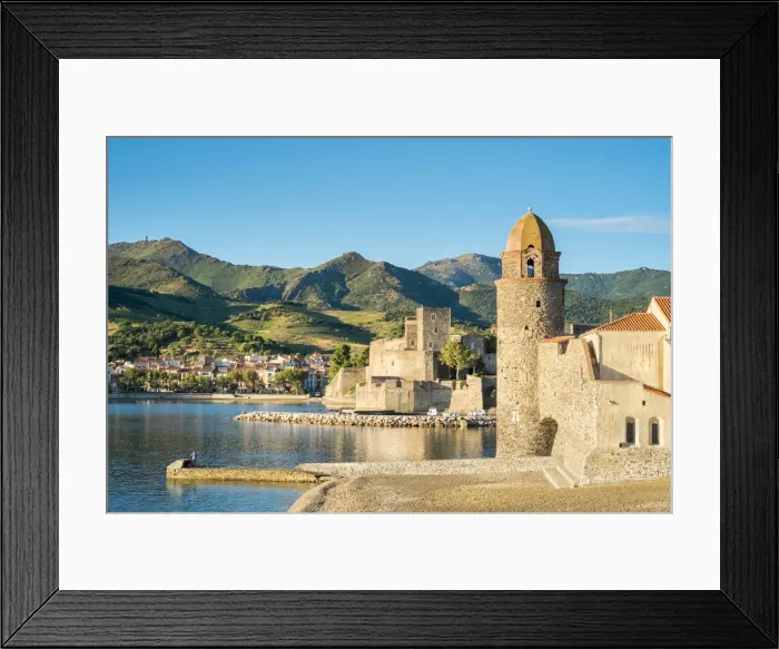 Framed Print : Clocktower of Notre-Dame-des-Anges church and the ChAteau Royal de Collioure, Collioure Framed Print : Clocktower of Notre-Dame-des-Anges church and the ChAteau Royal de Collioure, Collioure