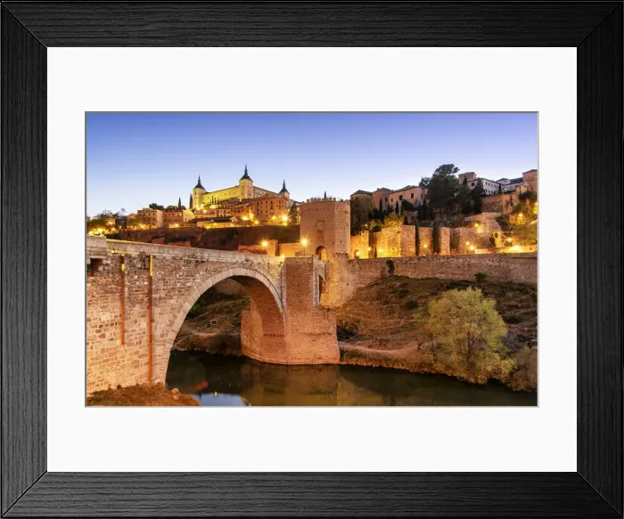 Framed Print : The Puente de Alcantara (Alcantara bridge) over the Tagus river, a roman bridge that Framed Print : The Puente de Alcantara (Alcantara bridge) over the Tagus river, a roman bridge that