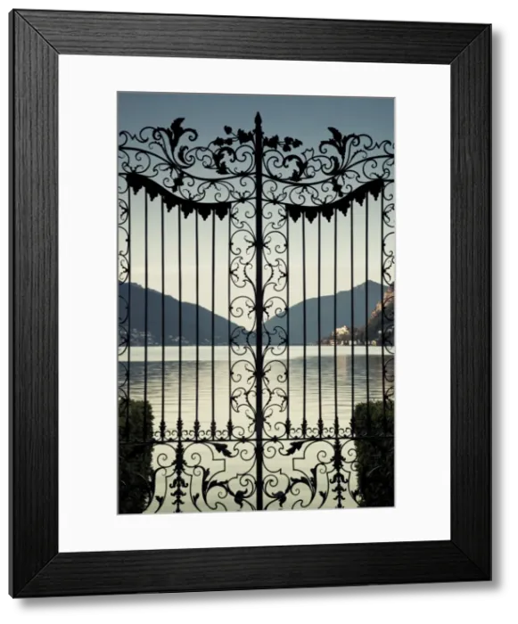 Framed Print : Switzerland, Ticino, Lake Lugano, Lugano, Parco Civico gate lake view, dawn Framed Print : Switzerland, Ticino, Lake Lugano, Lugano, Parco Civico gate lake view, dawn