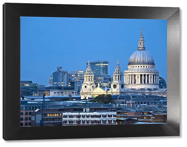 England, London, City skyline looking towards St Pauls Cathedral at twilight