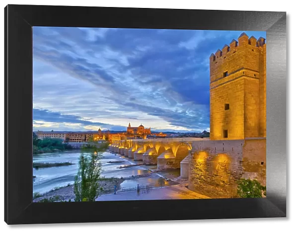Spain, Andalucia, Cordoba Province, Cordoba, Roman Bridge (Puente Romano) over Guadalquivir River and Mezquita (Mosque‚AiCathedral of Cordoba, UNESCO World Heritage Site)