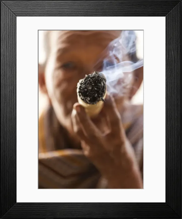Framed Print : Woman smoking cheroot, cigarette, cigar, Burma (Myanmar) Framed Print : Woman smoking cheroot, cigarette, cigar, Burma (Myanmar)