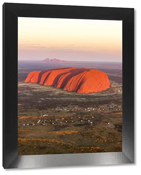 Uluru and Kata Tjuta at sunrise, Aerial view. Northern Territory, Australia
