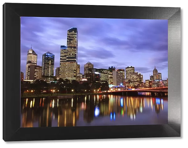 Australia, Victoria, Melbourne, City skline reflected in Yarra River