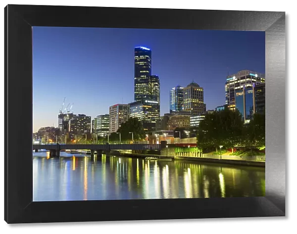 Rialto Towers and skyline along Yarra River at dusk, Melbourne, Victoria, Australia