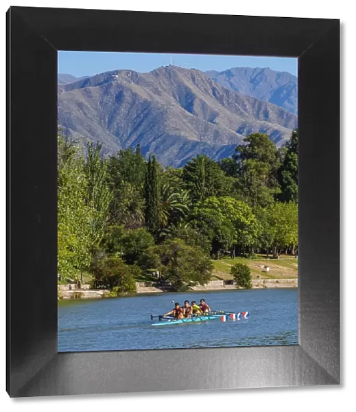 Kayakers on the lake with Andes in the background, General San Martin Park, Mendoza