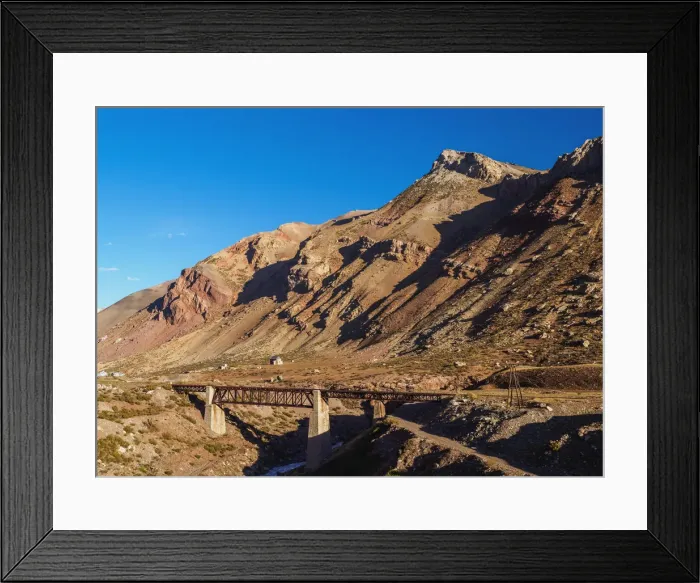 Framed Print : Transandine Railway Bridge over Las Cuevas River near Puente del Inca, Central Andes Framed Print : Transandine Railway Bridge over Las Cuevas River near Puente del Inca, Central Andes