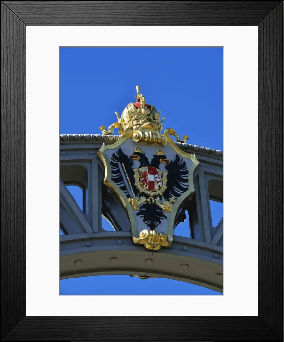 Framed Print : Austrian coat of arms on the countries bridge between Bavaria and Salzburg, running Framed Print : Austrian coat of arms on the countries bridge between Bavaria and Salzburg, running