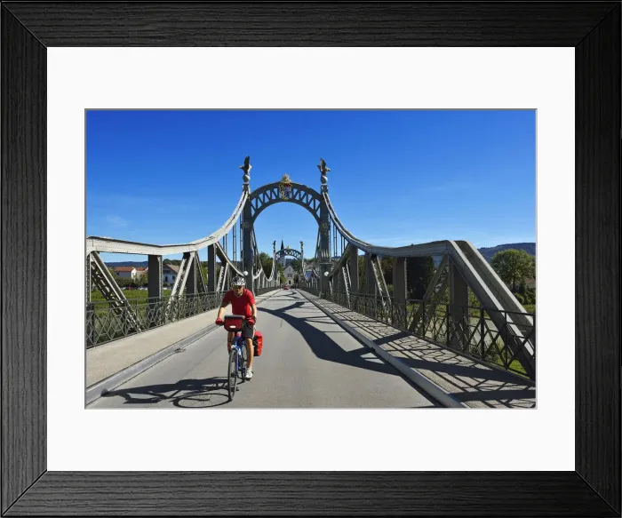 Framed Print : Cyclists on the countries bridge between Bavaria and Salzburg, running, Chiemgau Framed Print : Cyclists on the countries bridge between Bavaria and Salzburg, running, Chiemgau