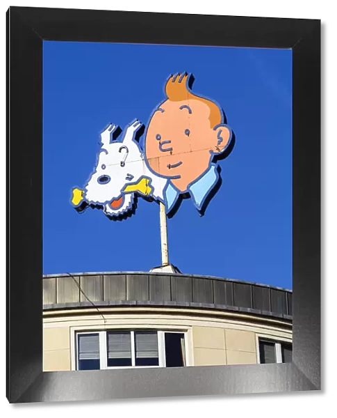 Tintin and Snowy comic characters appearing on the former headquarters of Tintin publisher