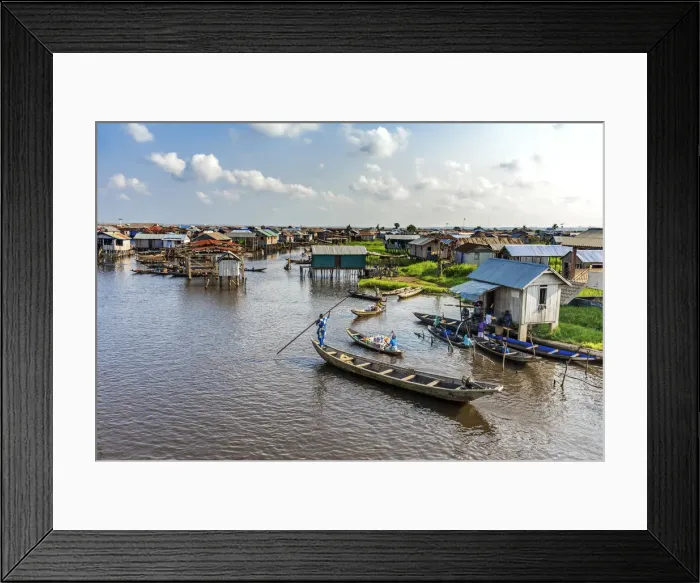 Framed Print : Africa, Benin, Ganvie. a scene on the main channel with boats, shops and stilt houses Framed Print : Africa, Benin, Ganvie. a scene on the main channel with boats, shops and stilt houses