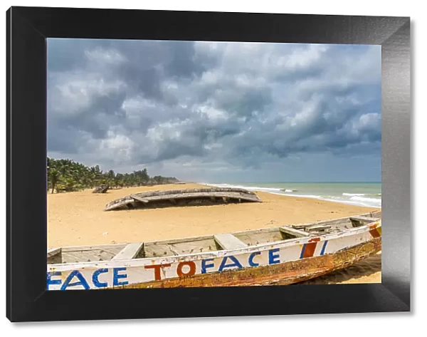 Africa, Benin, Grand Popo, coloured fishing boats on the sandy beach